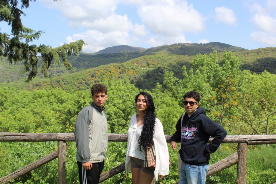 Three participants among the hills