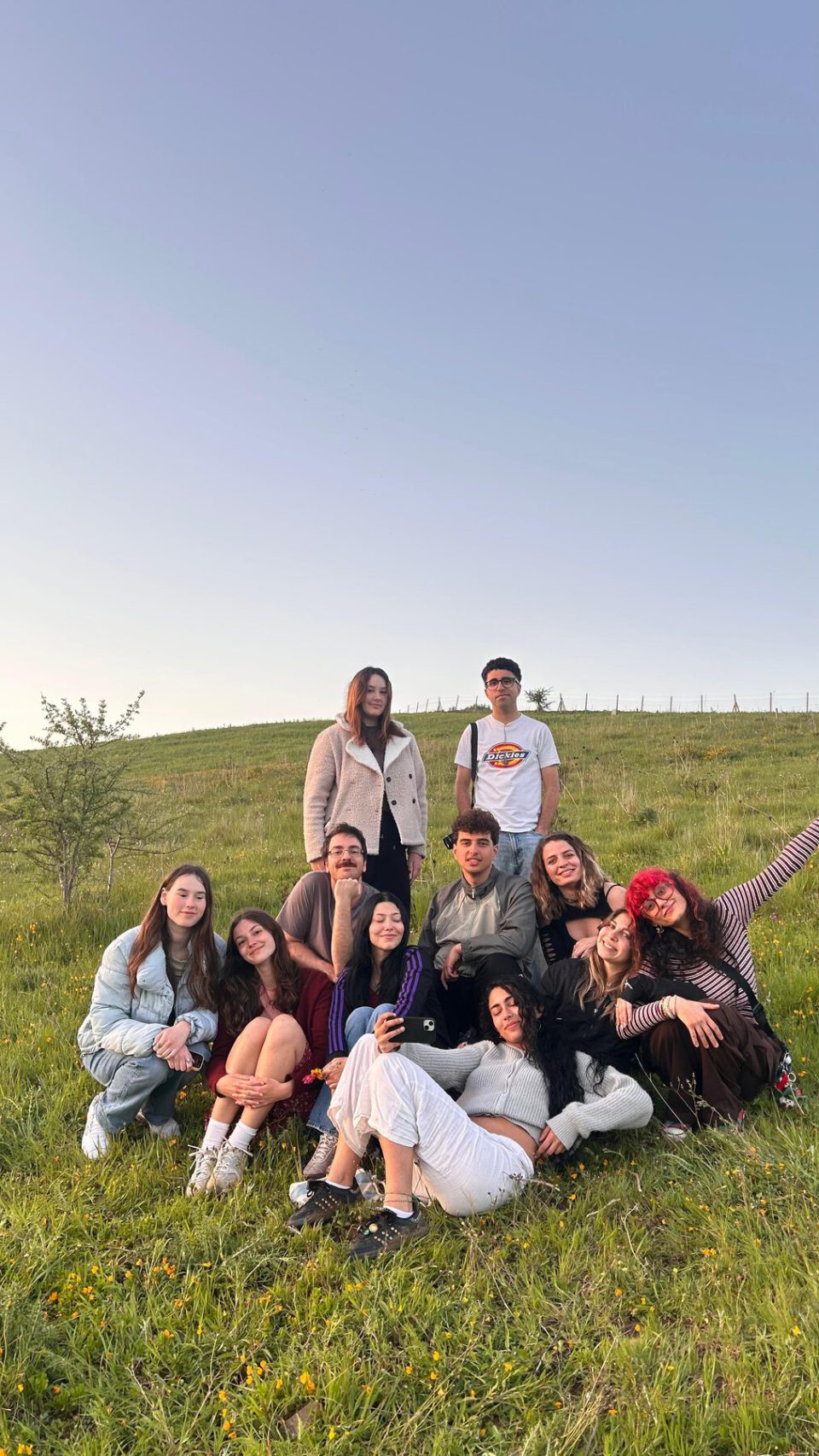 Young people sitting on the grass during Sustainable Visions
